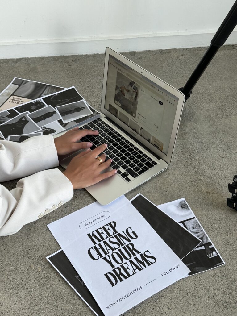 Blogger on her computer getting inspiration and typing on a computer